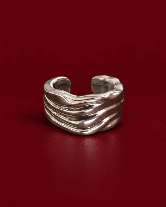 Blurr Ear Cuff in 925 recycled sterling silver on burgundy
